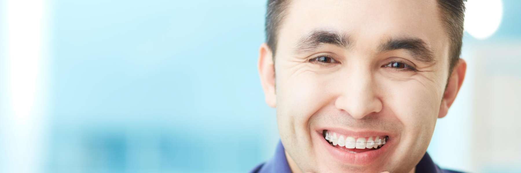 man with orthodontic braces bakersfield